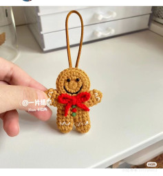 Crochet Gingerbread Man Ornament Pattern With Red Bow
