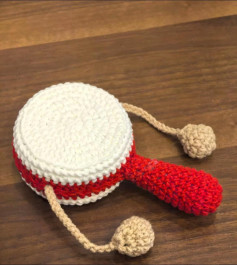 Crochet Pattern for a Handmade Drum Toy with Handle