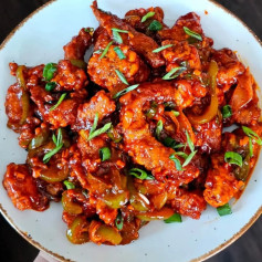 Sizzling Schezwan Crispy Chicken Delight