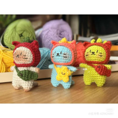 Adorable Crochet Animal Dolls with Colorful Yarn Background
