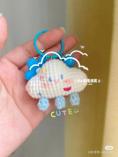 Adorable Crochet Cloud Keychain with Smiling Face and Colorful Details