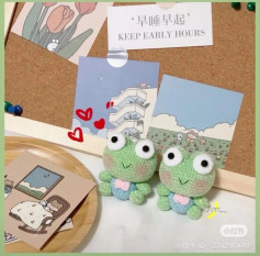 Adorable Crochet Frogs with a Cute Sleeping Theme Background