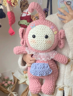 Adorable Pink Crochet Toy with Cute Accessories and Details