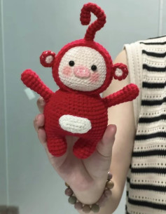 Adorable Red Crochet Toy with Ears and Curly Antenna