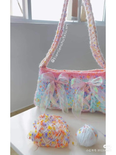 Colorful Crochet Bag with Ribbon Details and Yarn Balls