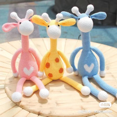 Colorful Crochet Giraffes with Heart Patterns for Amigurumi Lovers