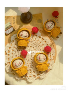 Crochet Pattern for Cute Yellow Raincoat Dolls with Red Balloons