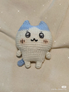 Cute Crochet Cat Pattern with Blue Ears and Blush Cheeks