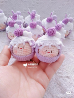 Cute Crochet Doll Pattern with Purple and White Details
