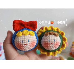 Cute Crochet Dolls with Colorful Accessories and Smiling Faces
