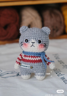 Cute Crochet Kitten in Striped Sweater and Blue Scarf