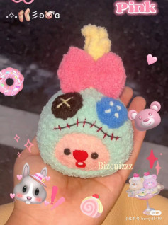 Cute Crochet Plushie with Colorful Bow and Button Details