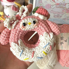Cute Pink Crochet Donut with Animal Face and Strawberry Accent
