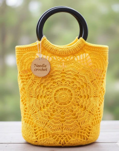 Elegant Yellow Crochet Bag with Circular Pattern Design