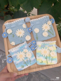 Handmade Crochet Pouches with Daisies and Blue Flower Details