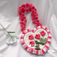 Heart-Shaped Crochet Bag with Pink Floral Design Pattern