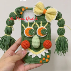 Whimsical Crochet Phone Case with Playful Face Design