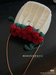 Crochet Bonnet with Red Rose and Green Leaf Design