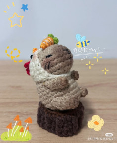 Crochet Cat Wearing Chicken Costume on Wooden Base