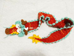 Crochet Dragon Scarf Pattern with Vibrant Colors and Fun Design