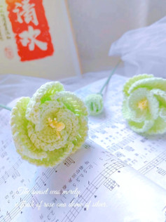 Crochet Flowers on Music Sheets with Artistic Background