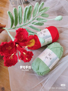 Crochet Pattern for Vibrant Flower with Lush Green Leaves