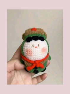 Cute Crochet Character with Red Star and Scarf Pattern