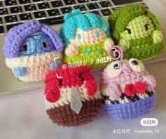 Cute Crochet Characters on a Laptop Keyboard Background