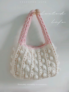 Elegant Crochet Handbag with Pink and White Patterns