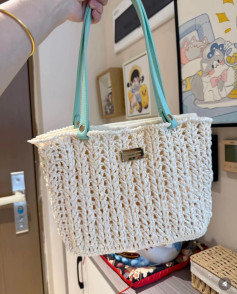 Elegant Handcrafted Crochet Bag with Light Blue Handles