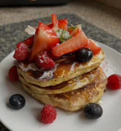 Fluffy Blueberry Pancakes with Fresh Berry Medley