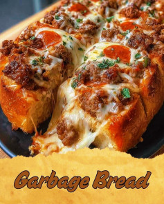 Loaded Garbage Bread with Sausage, Peppers, and Melty Cheese