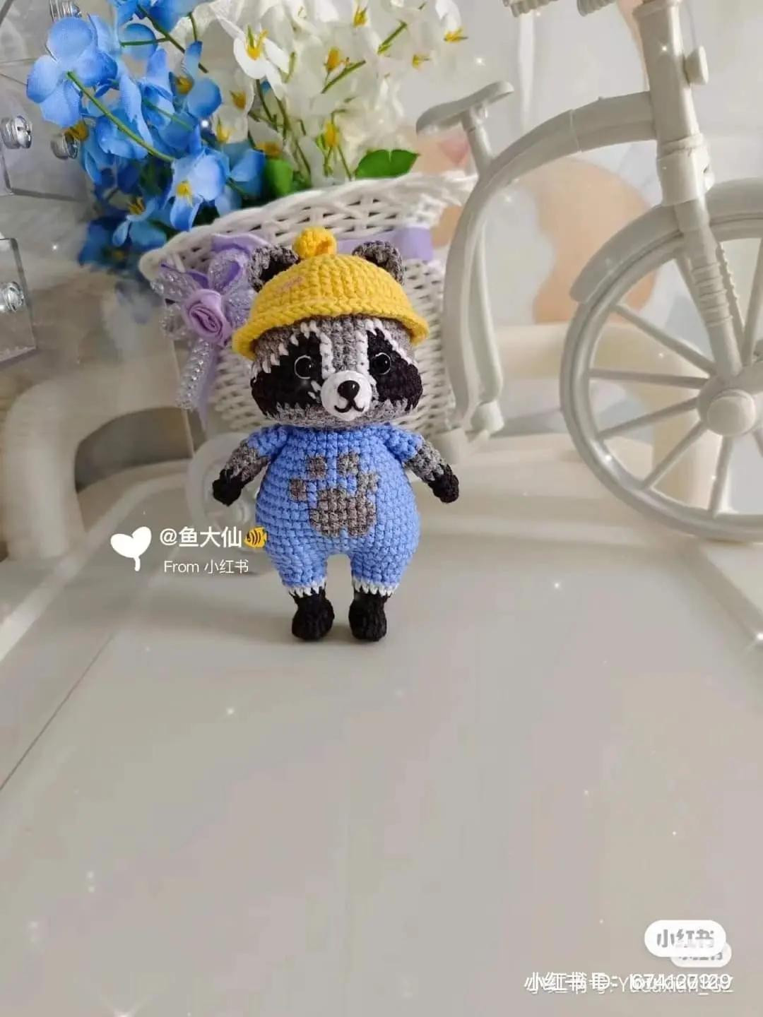 Amigurumi Crochet Pattern for Little Raccoon with Yellow Hat and Blue Outfit