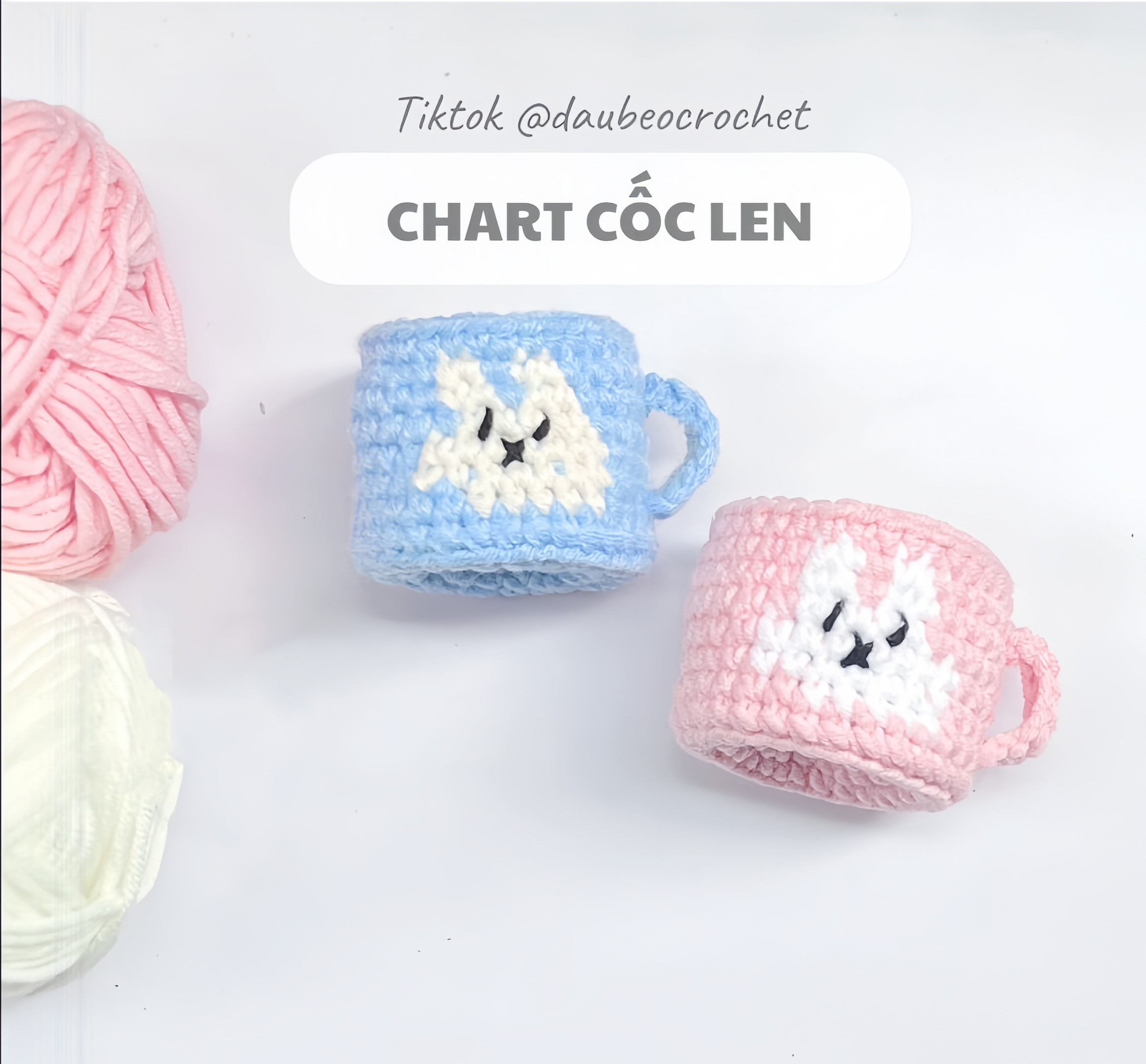 Chart móc cốc len mặt thỏ màu hồng và xanh