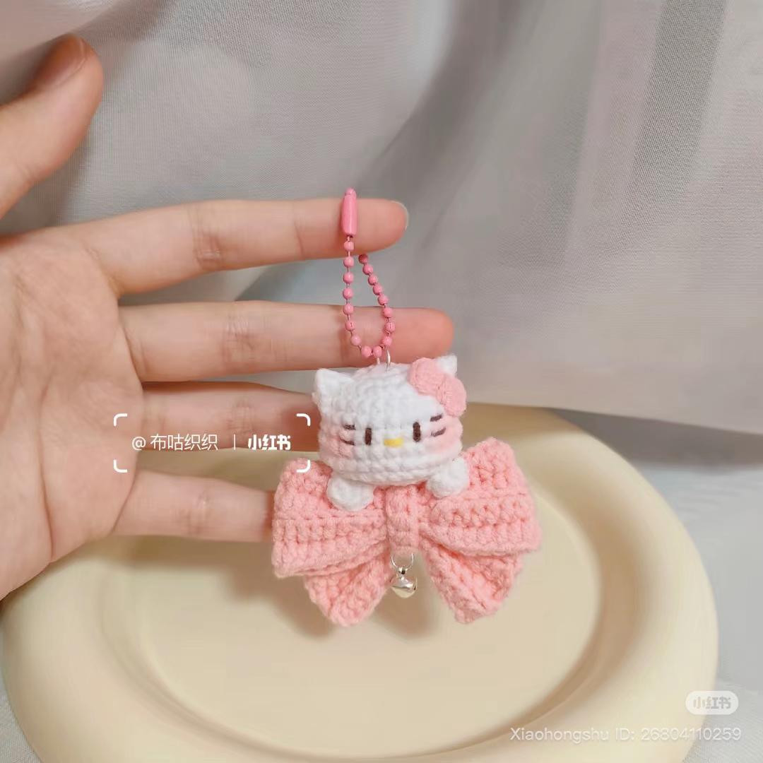 Chart móc Kitty ôm nơ hồng trắng dễ thương