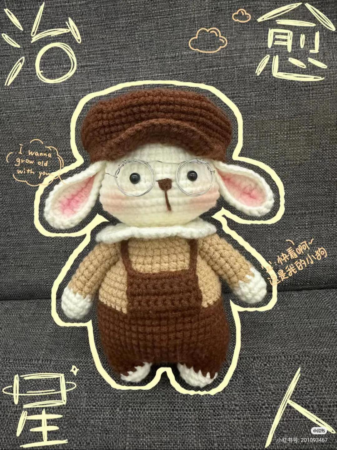 Chart móc len thỏ đeo kính, mặc áo liền quần và mũ nỉ màu nâu