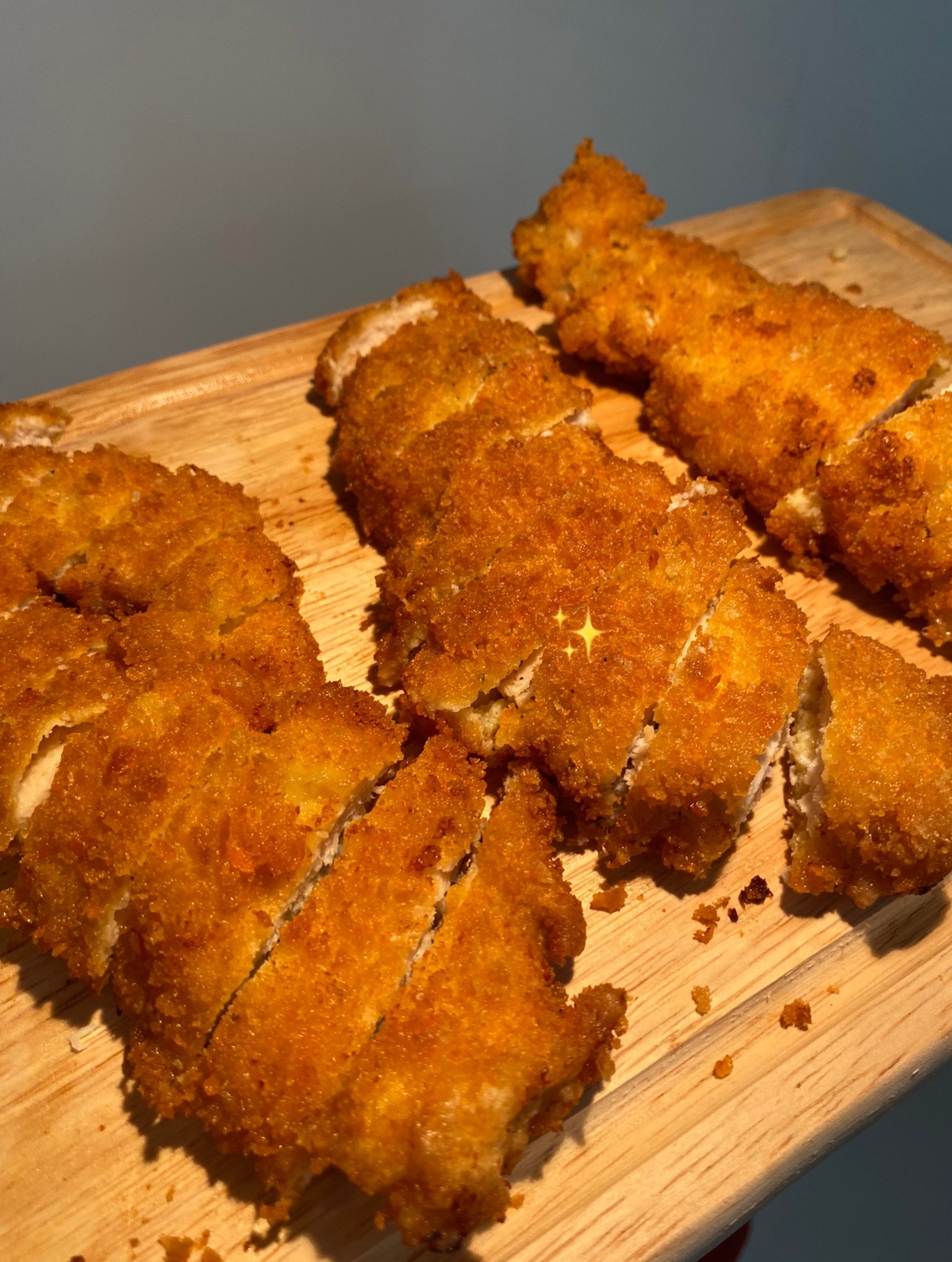 Chicken Katsu Curry with rice, crispy fried chicken breast served in savory curry sauce