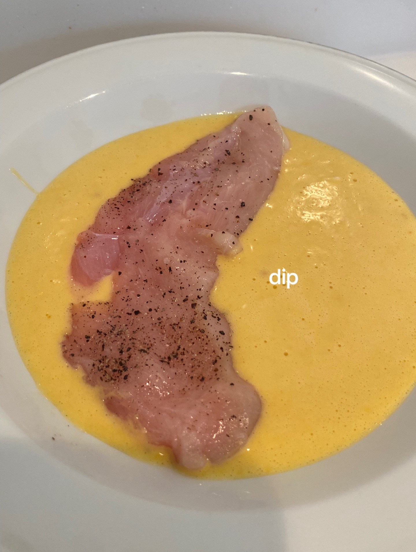 Chicken Katsu Curry with rice, crispy fried chicken breast served in savory curry sauce