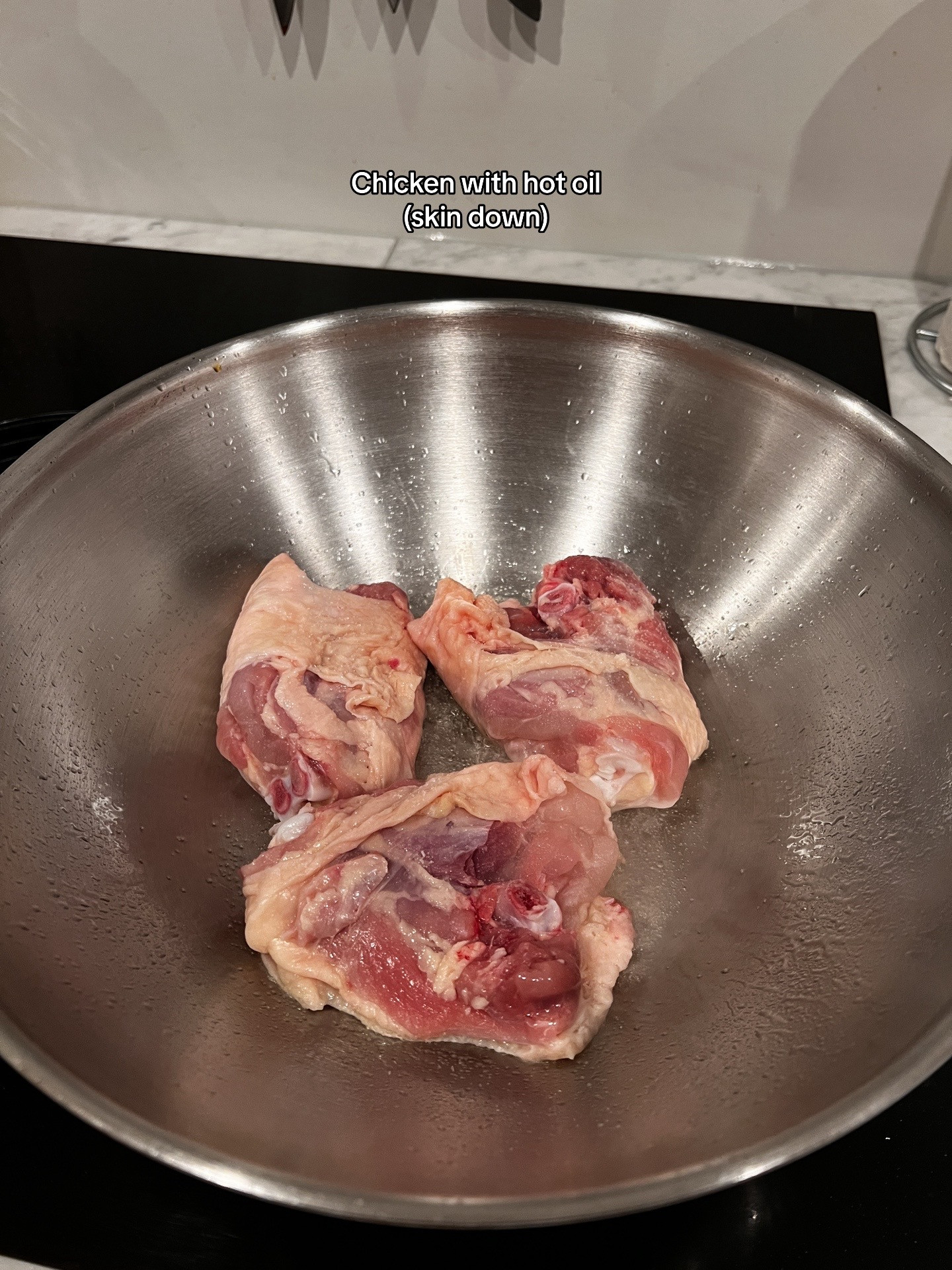 Chicken Massaman Curry with rice, topped with cashew & coriander