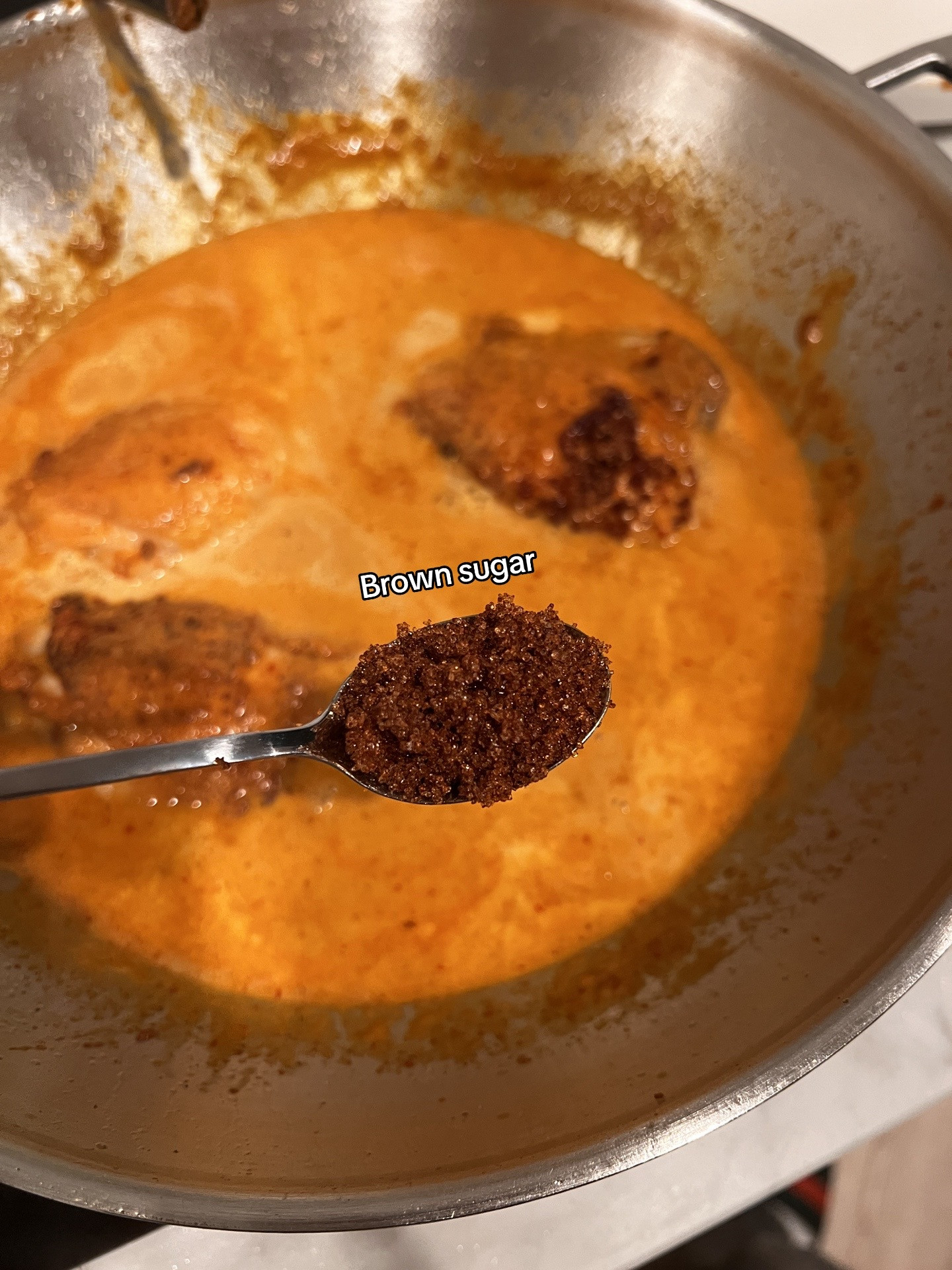 Chicken Massaman Curry with rice, topped with cashew & coriander