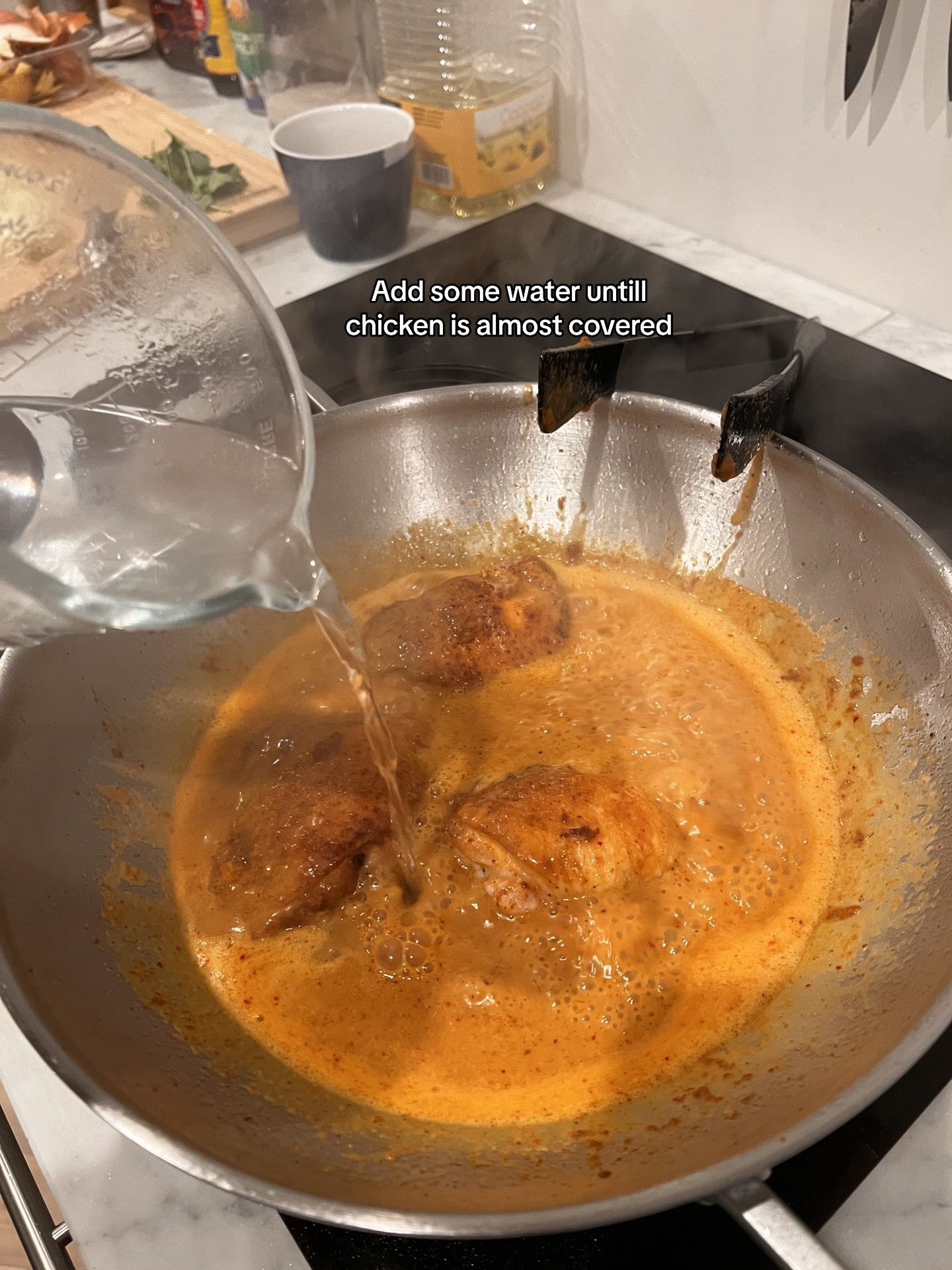 Chicken Massaman Curry with rice, topped with cashew & coriander