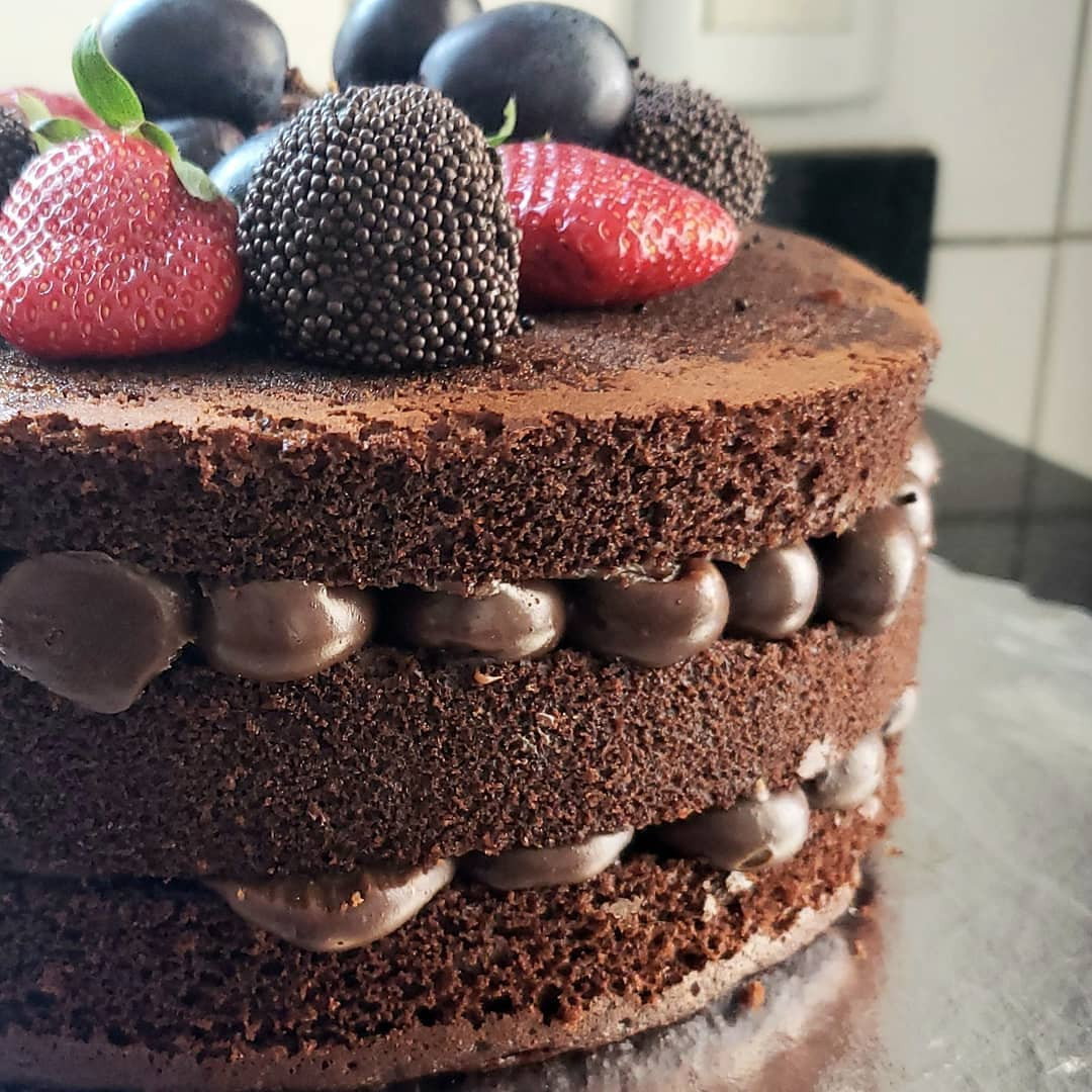 Chocolate layer cake with Maltesers and fresh berries