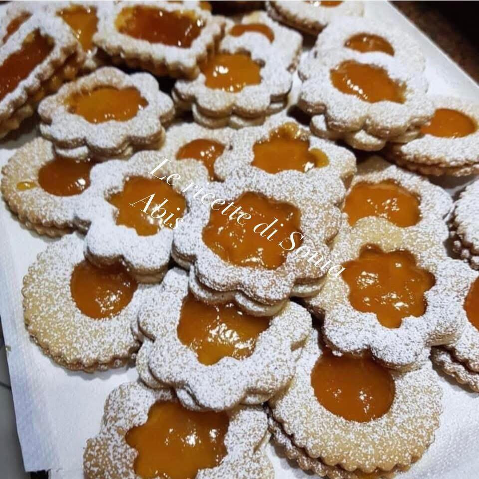 Ciambelle con marmellata: ricetta dolce con farina, uova, strutto e cannella