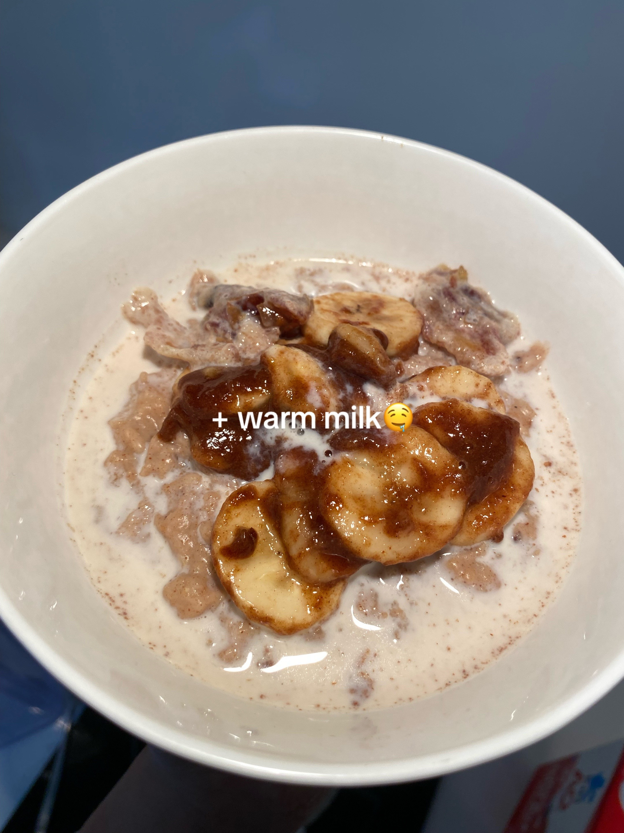 Creamy oatmeal with caramelized banana, cinnamon, and warm milk