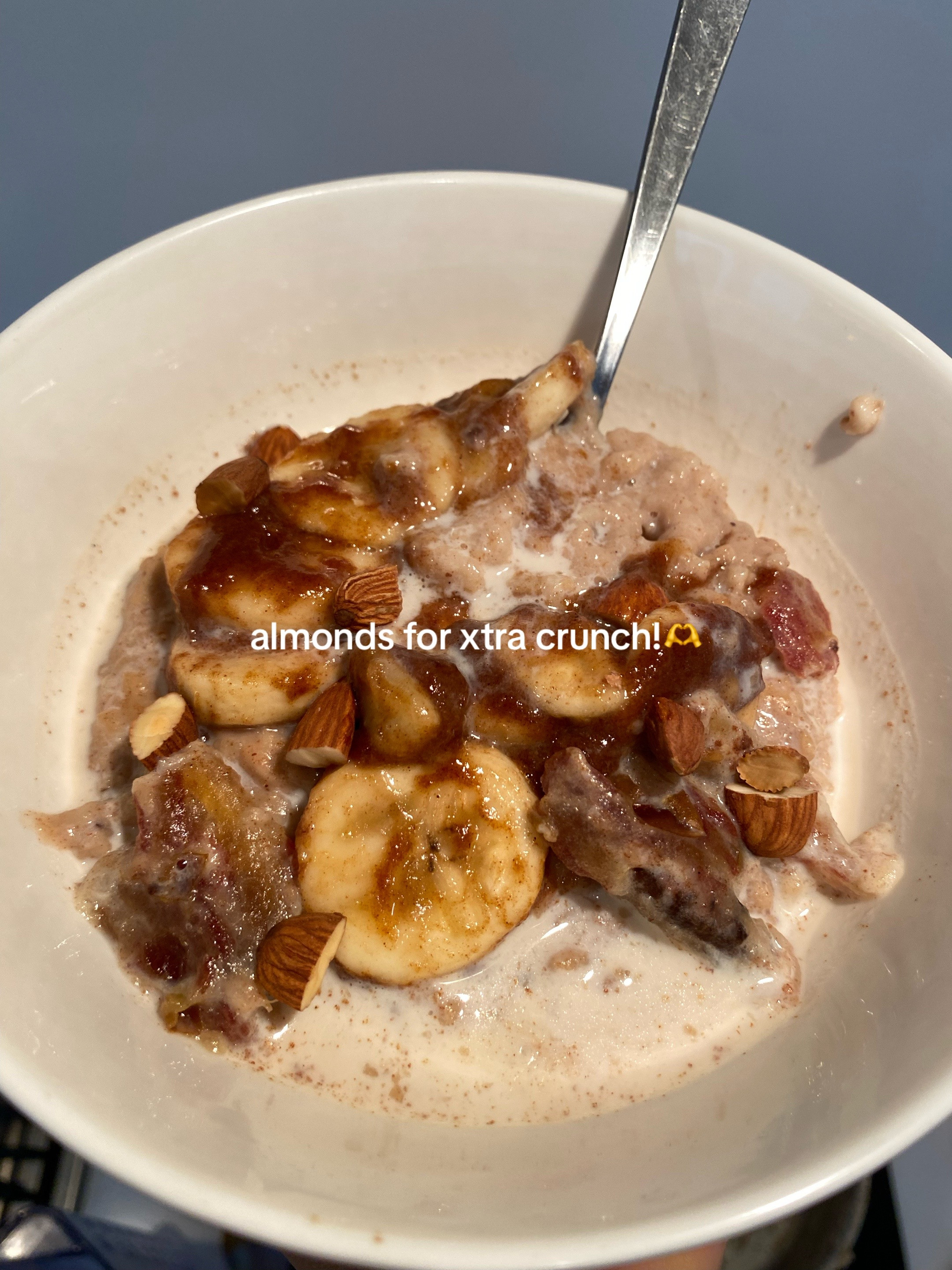 Creamy oatmeal with caramelized banana, cinnamon, and warm milk
