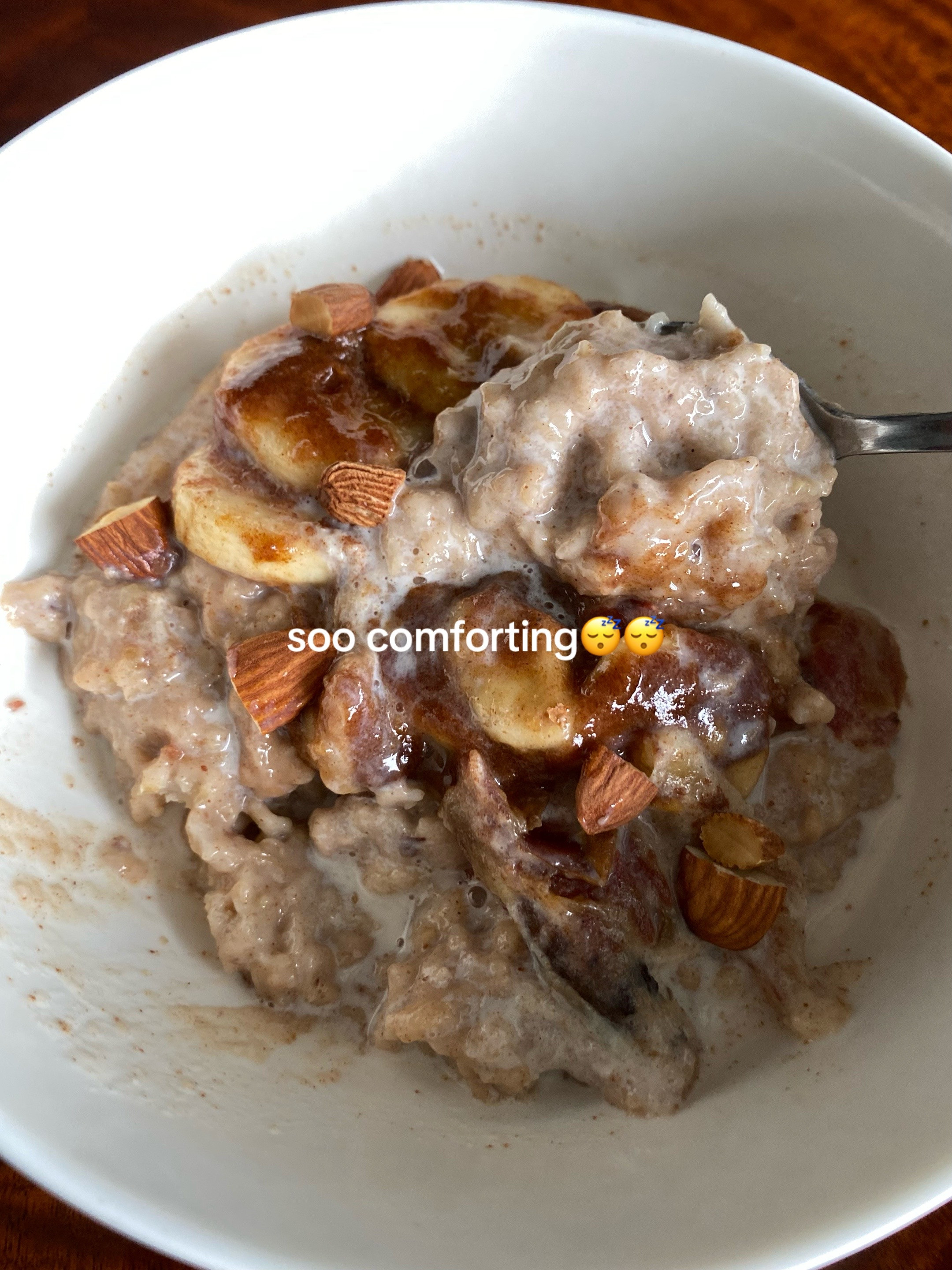 Creamy oatmeal with caramelized banana, cinnamon, and warm milk