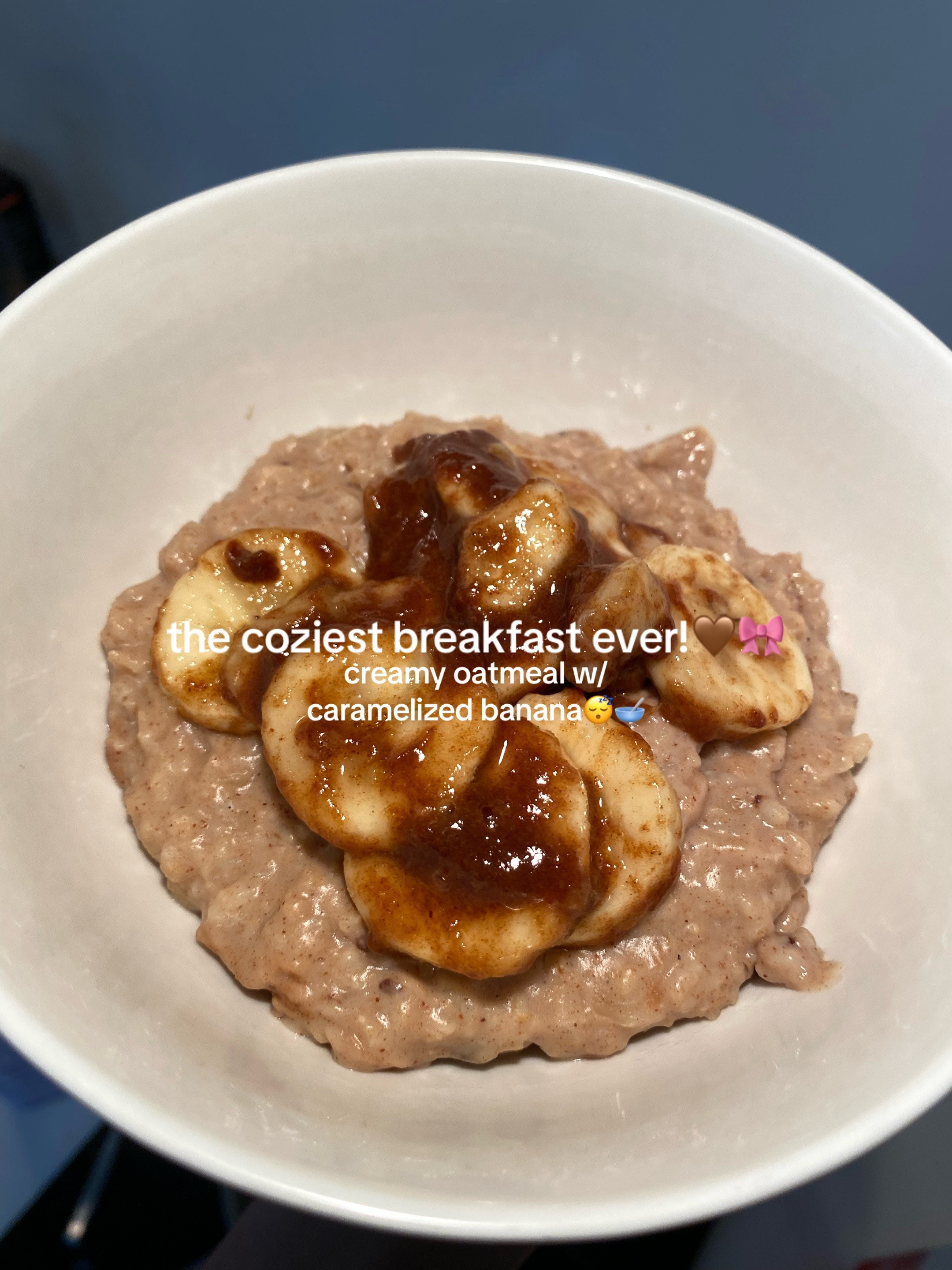 Creamy oatmeal with caramelized banana, cinnamon, and warm milk