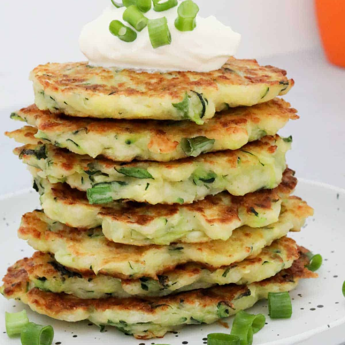 Crispy Halloumi & Zucchini Fritters with Sour Cream and Spring Onions