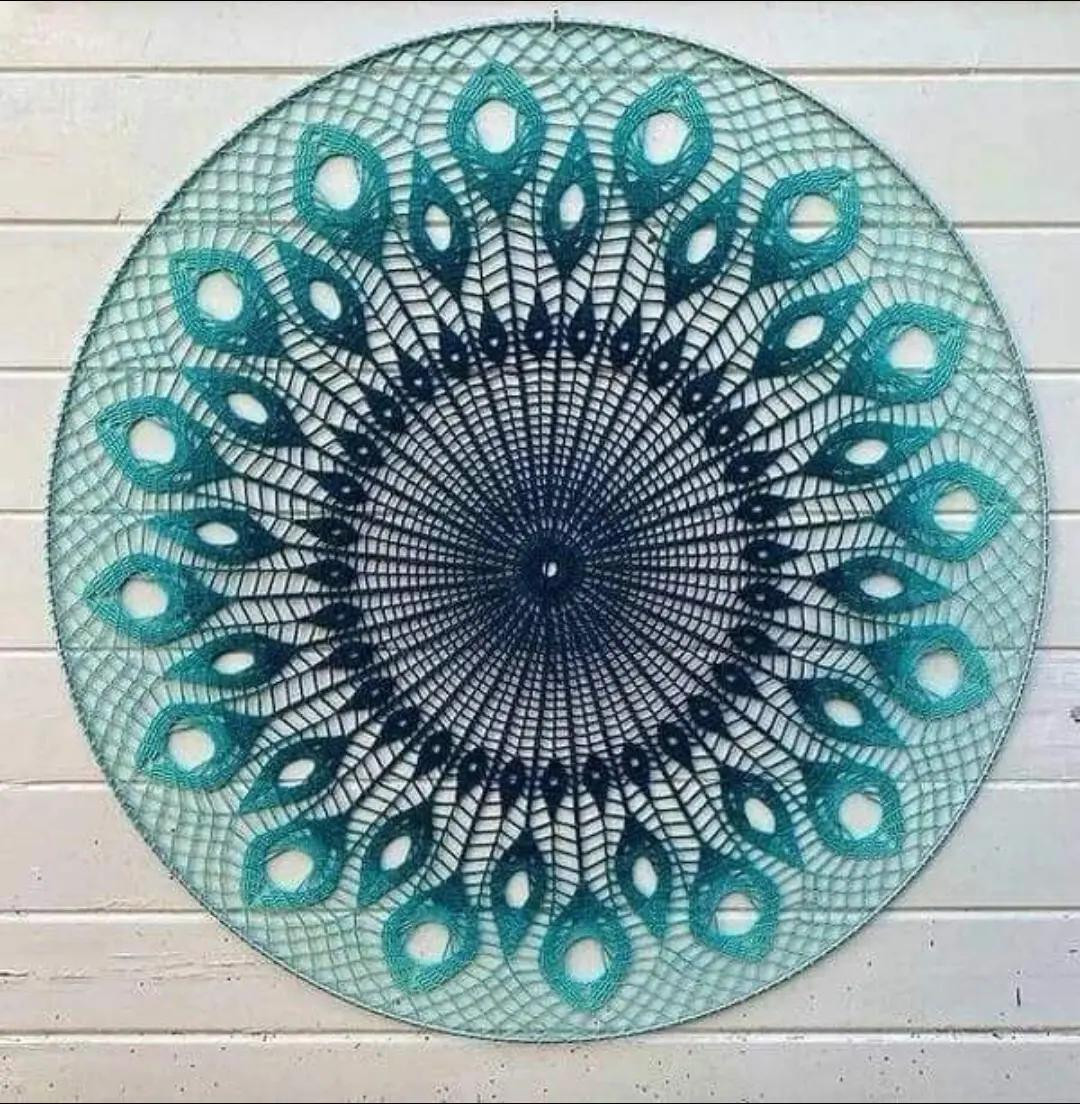 Crochet chart for sunflower and peacock feather round motifs with detailed stitch diagram