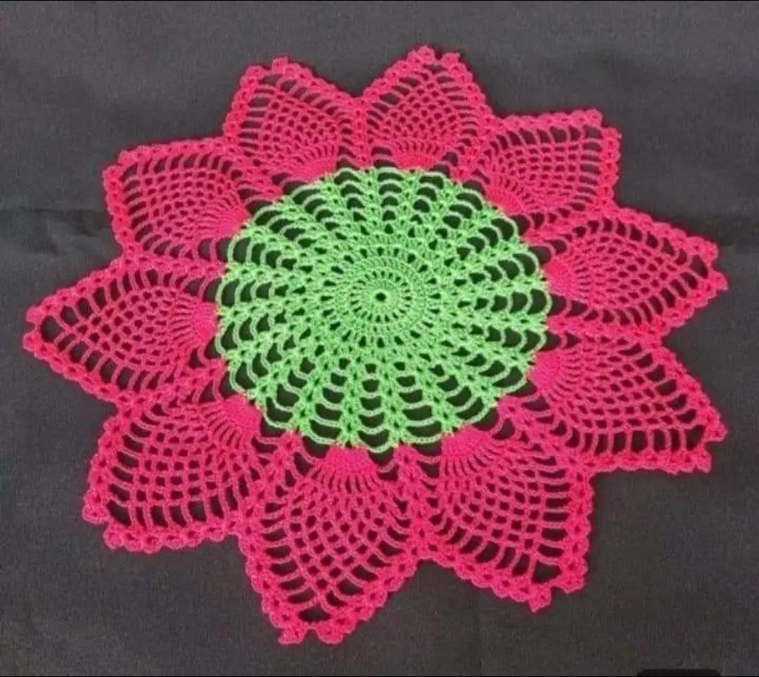 Crochet chart for sunflower and peacock feather round motifs with detailed stitch diagram